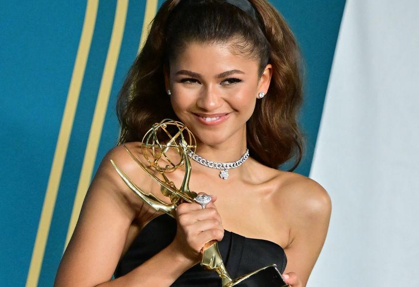 Zendaya poses with the Emmy for outstanding lead actress in drama series for "Euphoria" in 2022.